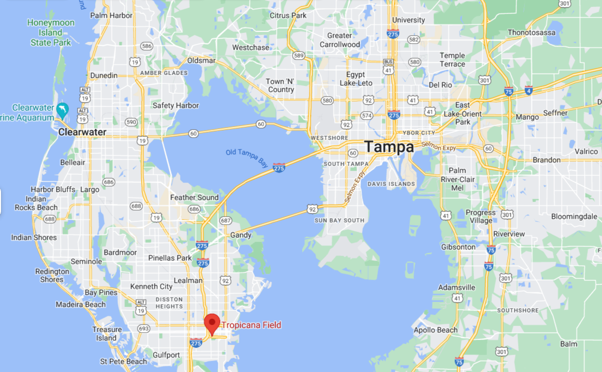 A Google Maps image of part of the Tampa Bay region, with a focus on the downtown area of the city of Tampa as well as St. Petersburg. Tropicana Field's location is marked on the map: a body of water connected by multiple bridges sits in between the two areas.